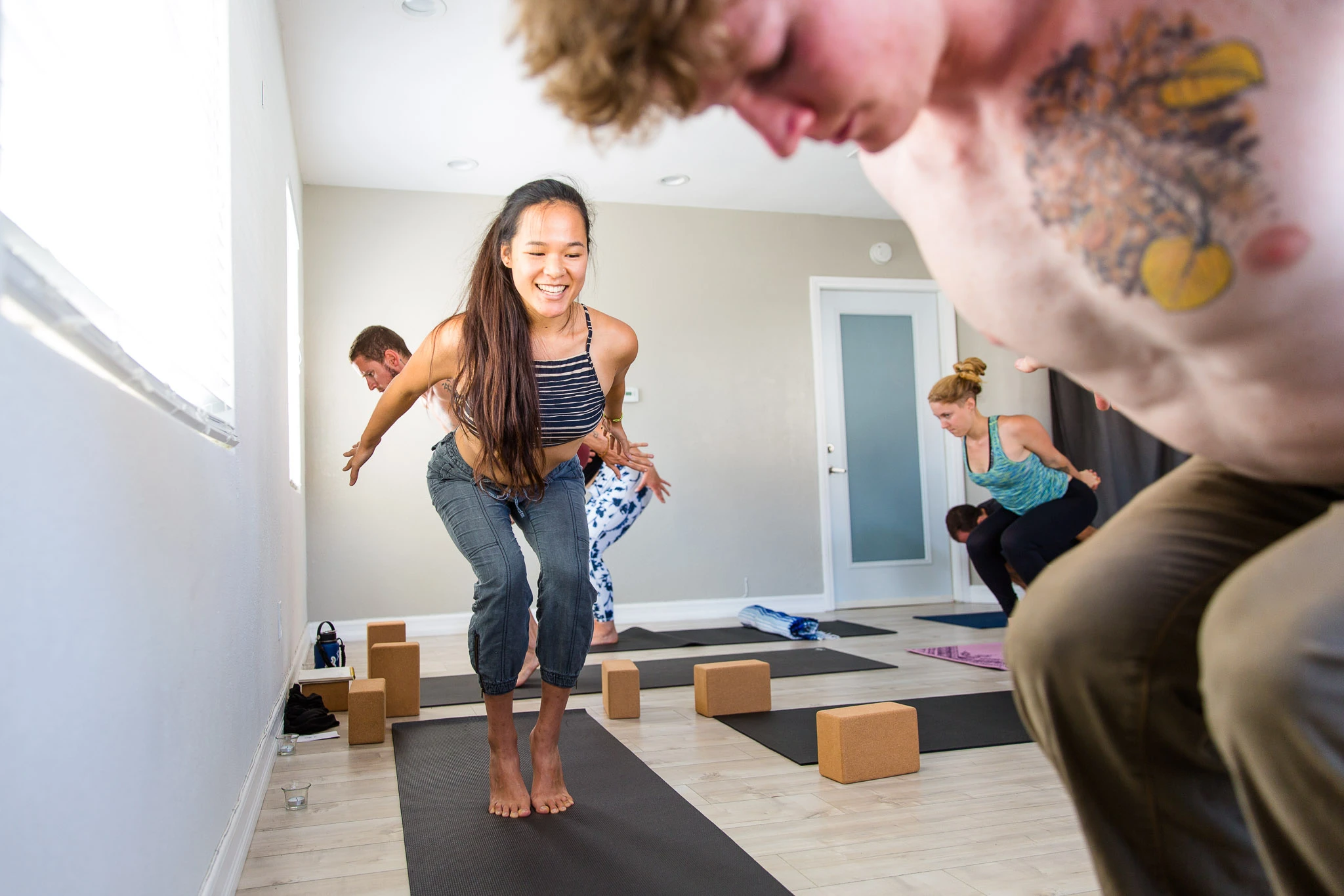 Participants practicing a balancing sequence during a past Union teacher training